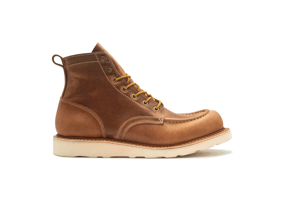 tan leather boot on a white background rotating 360° view
