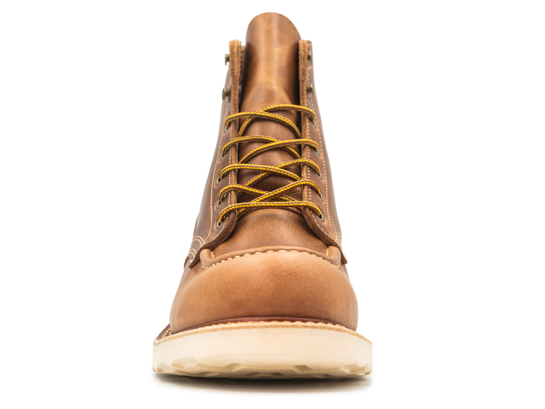 tan leather boot on a white background front view
