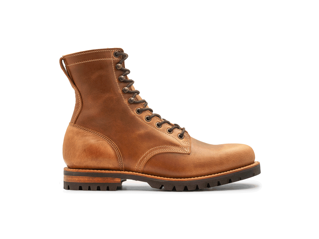 tan leather boot on a white background rotating 360° view