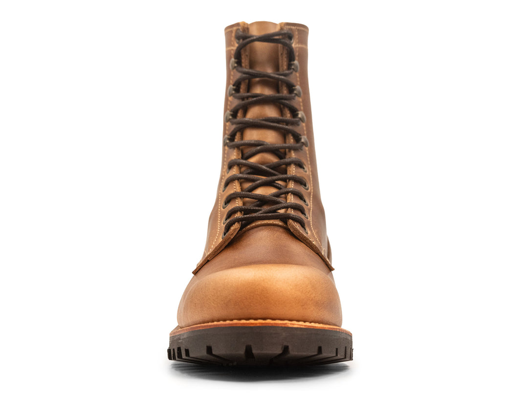 tan leather boot on a white background front view
