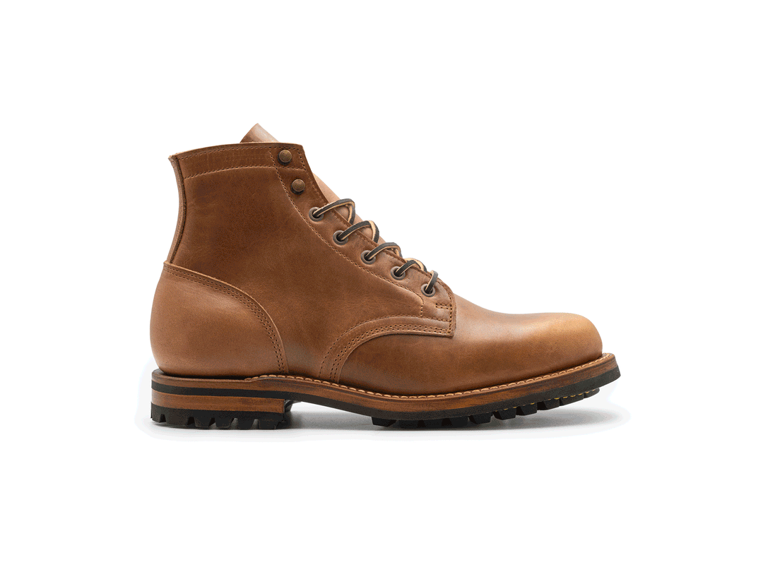 tan leather boot on a white background rotating 360° view