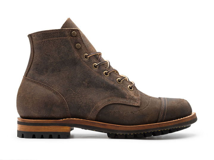 gray leather boot on a white background side view
