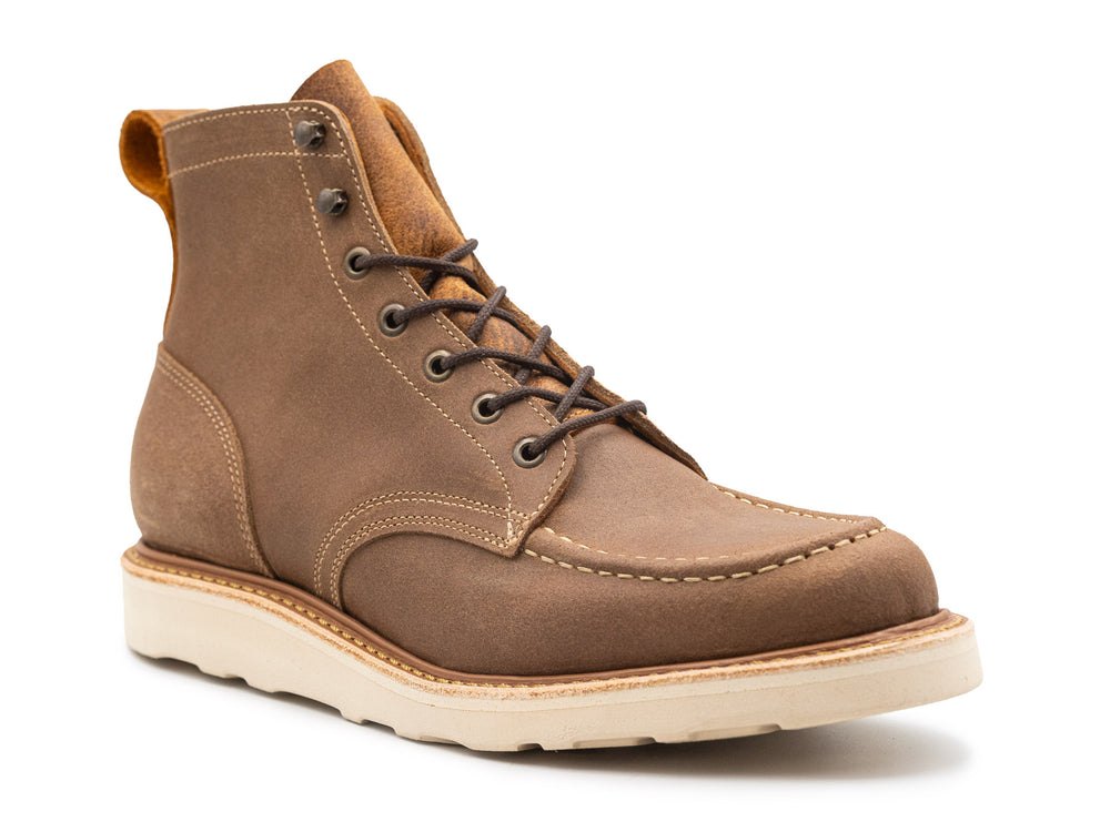 3QTR view of brown leather boot on white background