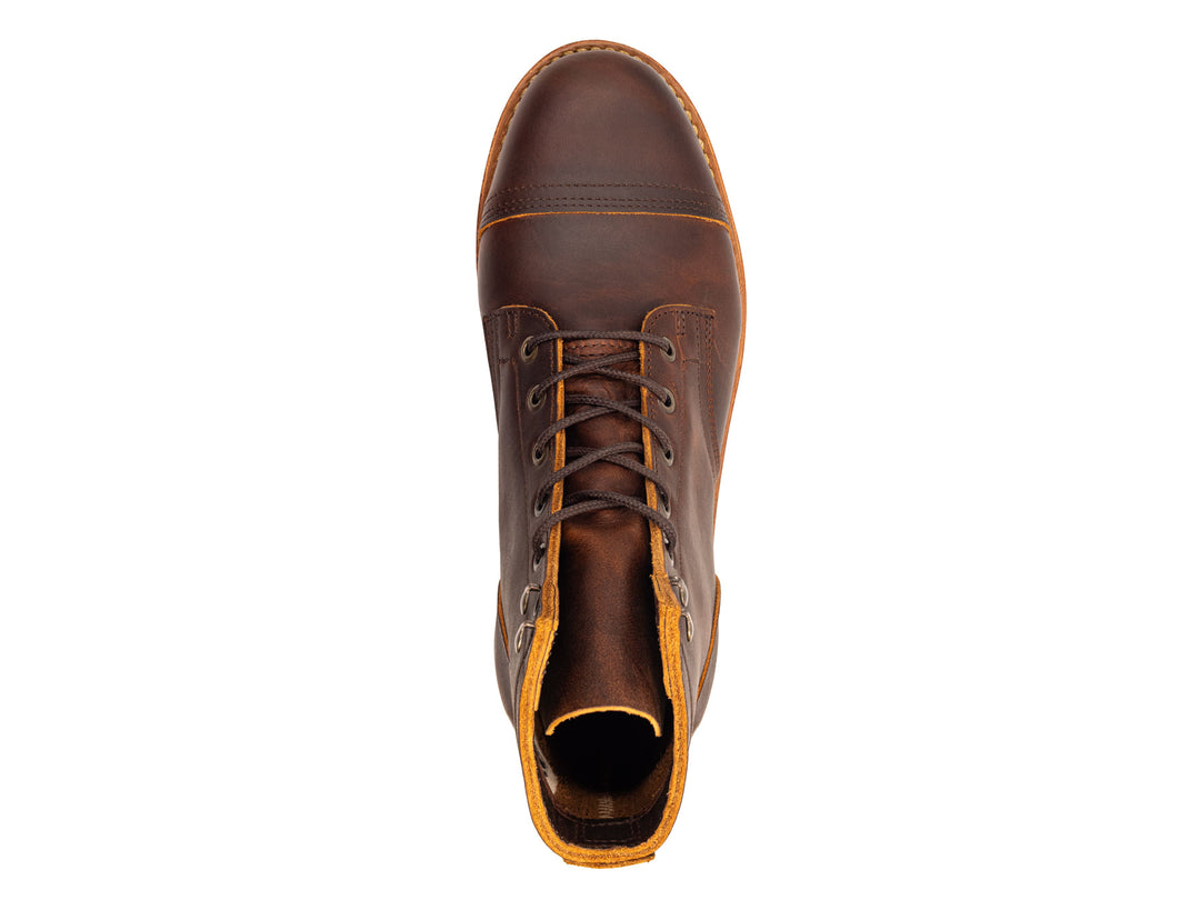 Brown leather boot with a white background topdown view