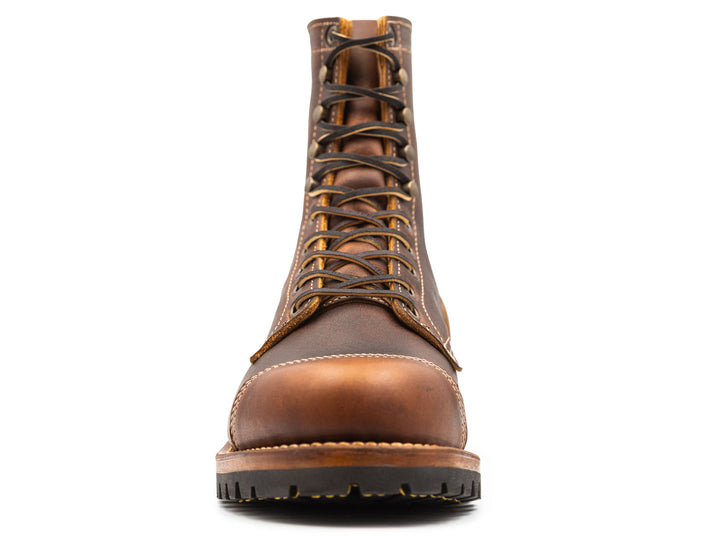 auburn brown leather boot on a white background front view